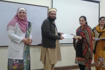 Dr Hamid presenting to Dr Irum1486376724.jpg